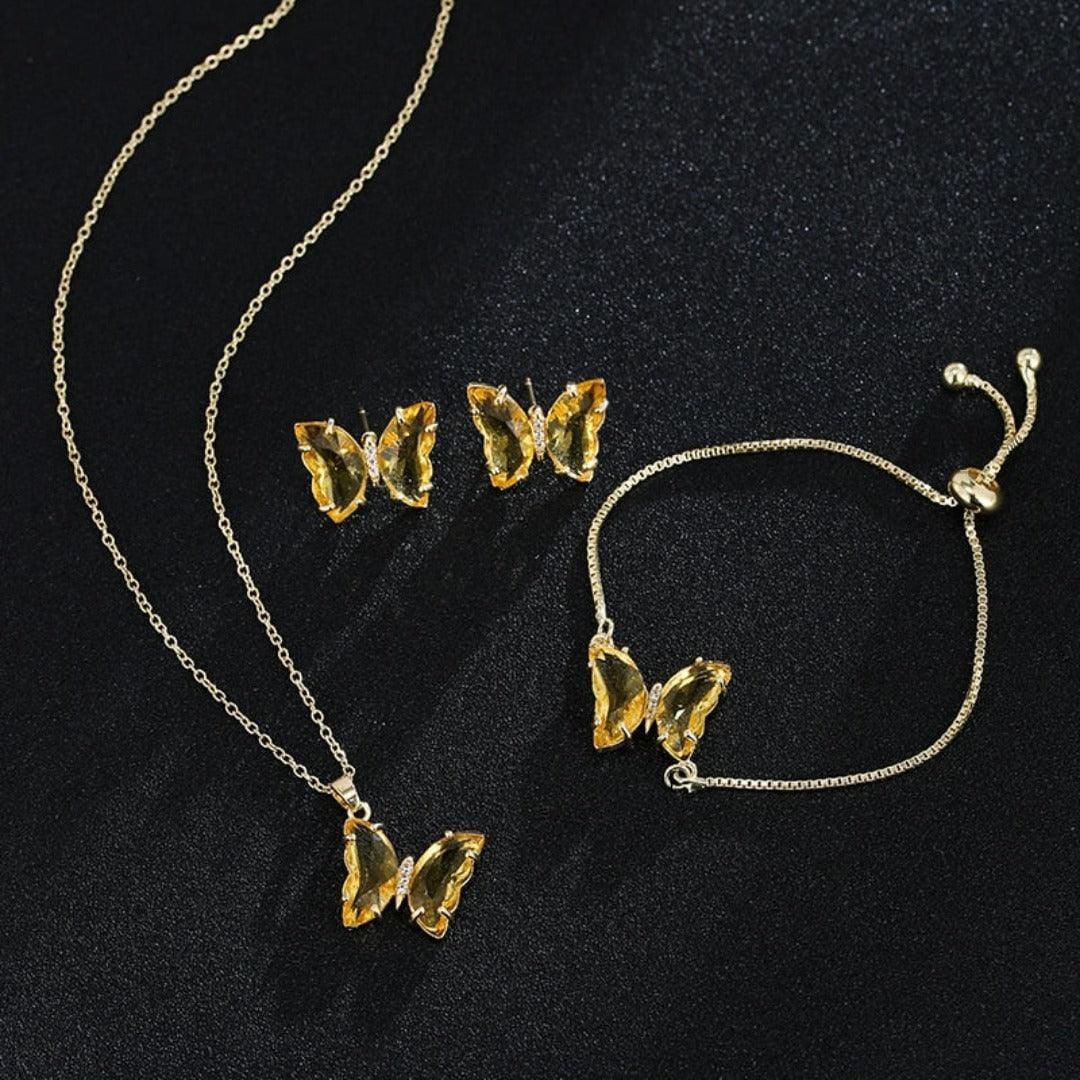 KIT Colar Pulseira e Brincos 3 Peças Jóias Romântica Borboleta de Vidro Varias Cores. 0 lojaidealgolden conjunto amarelo 