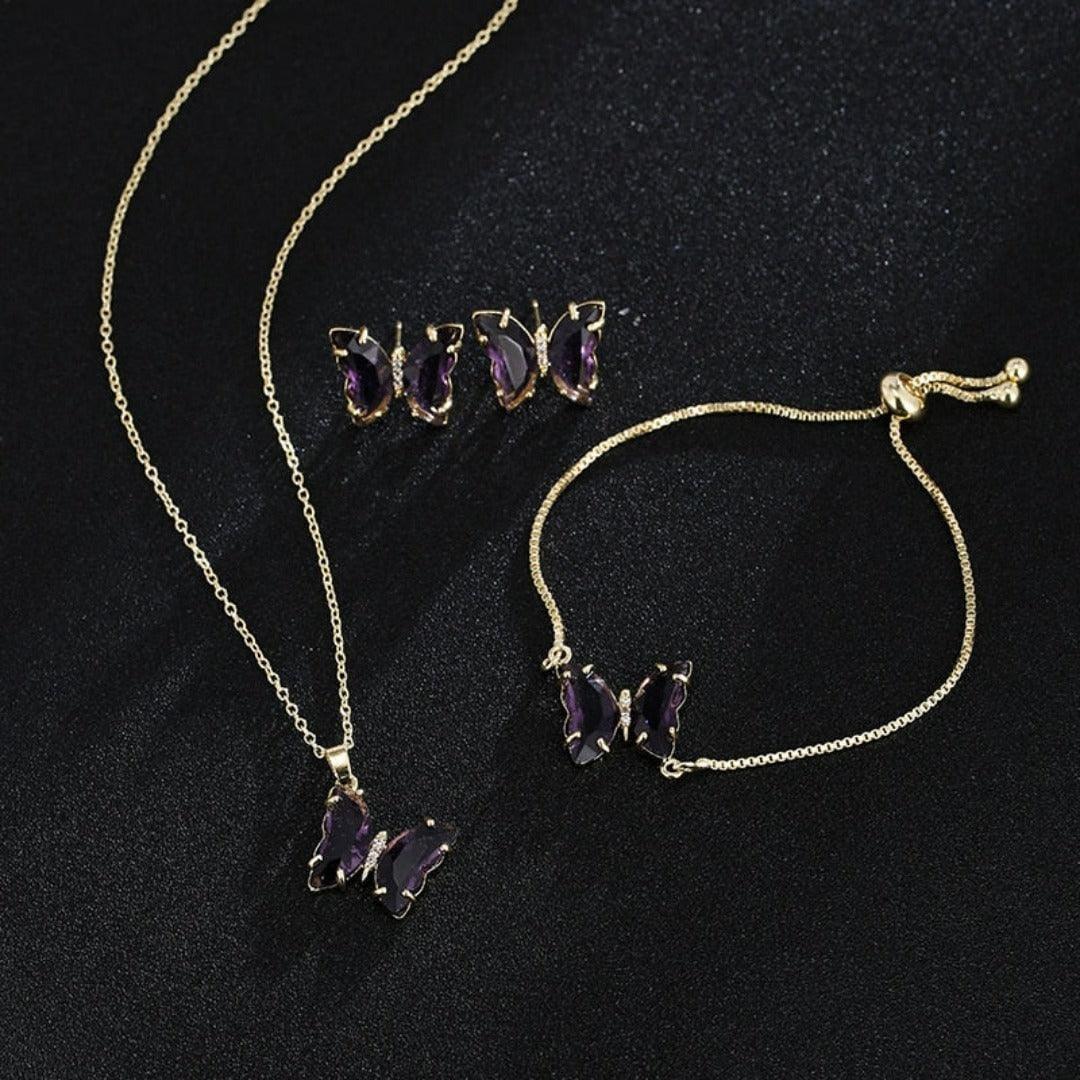 KIT Colar Pulseira e Brincos 3 Peças Jóias Romântica Borboleta de Vidro Varias Cores. 0 lojaidealgolden conjunto roxo escuro 